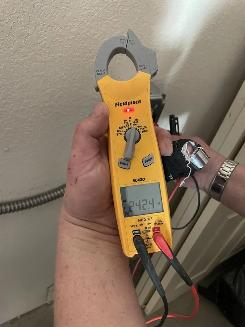 Voltage testing with clamp meter during Generator Installation in Candia